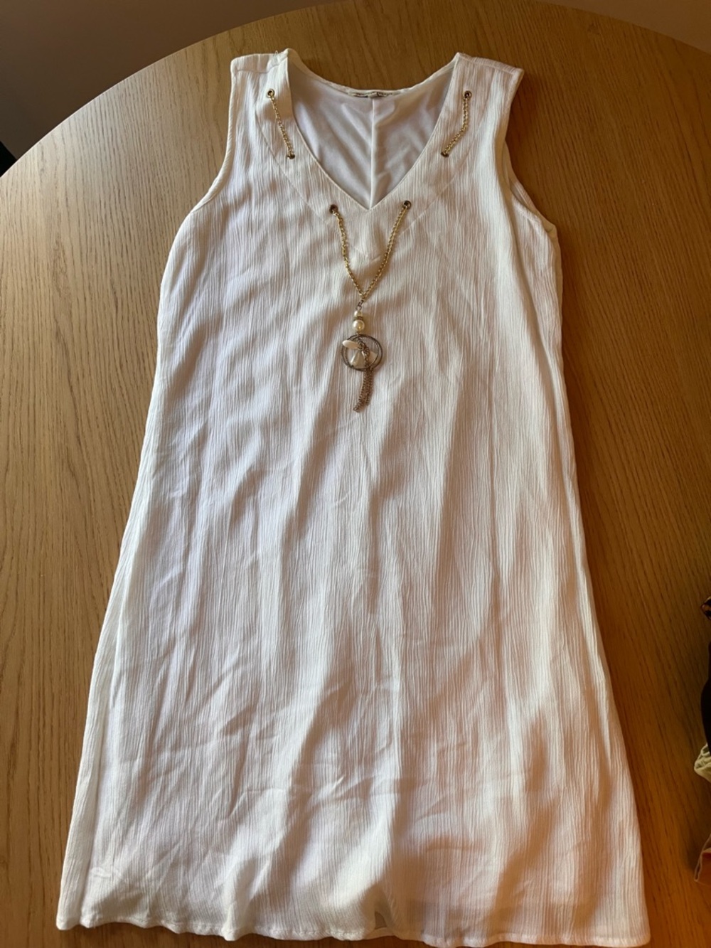 Sleeveless V-Neck Shift Dress with Gold Chain Accent